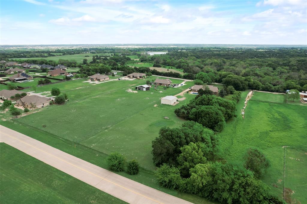 3870 Ledgestone Lane Midlothian, TX 76065 - Photo 4 of 5 a view of a green field with lots of green space