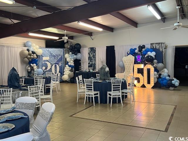 2100 Nesmith Road Nesmith, SC 29580 - Photo 29 of 37 Dining area featuring ceiling fan, beamed ceiling, and tile patterned floors