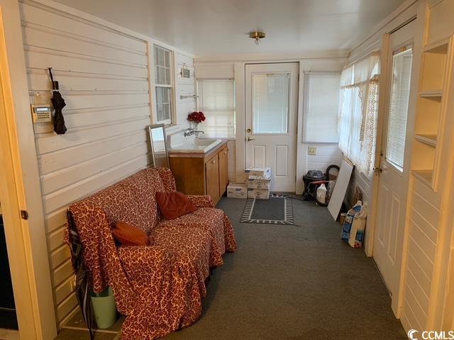 2100 Nesmith Road Nesmith, SC 29580 - Photo 8 of 37 Sunroom with carpet floors and a sink