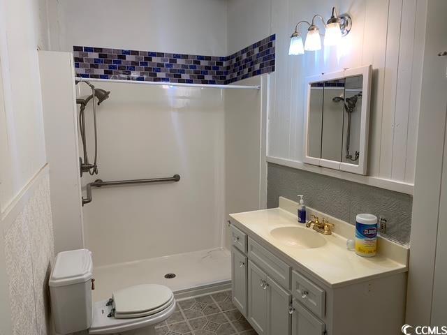 2100 Nesmith Road Nesmith, SC 29580 - Photo 9 of 37 Full bath featuring a shower stall, toilet, vanity, and tile patterned floors