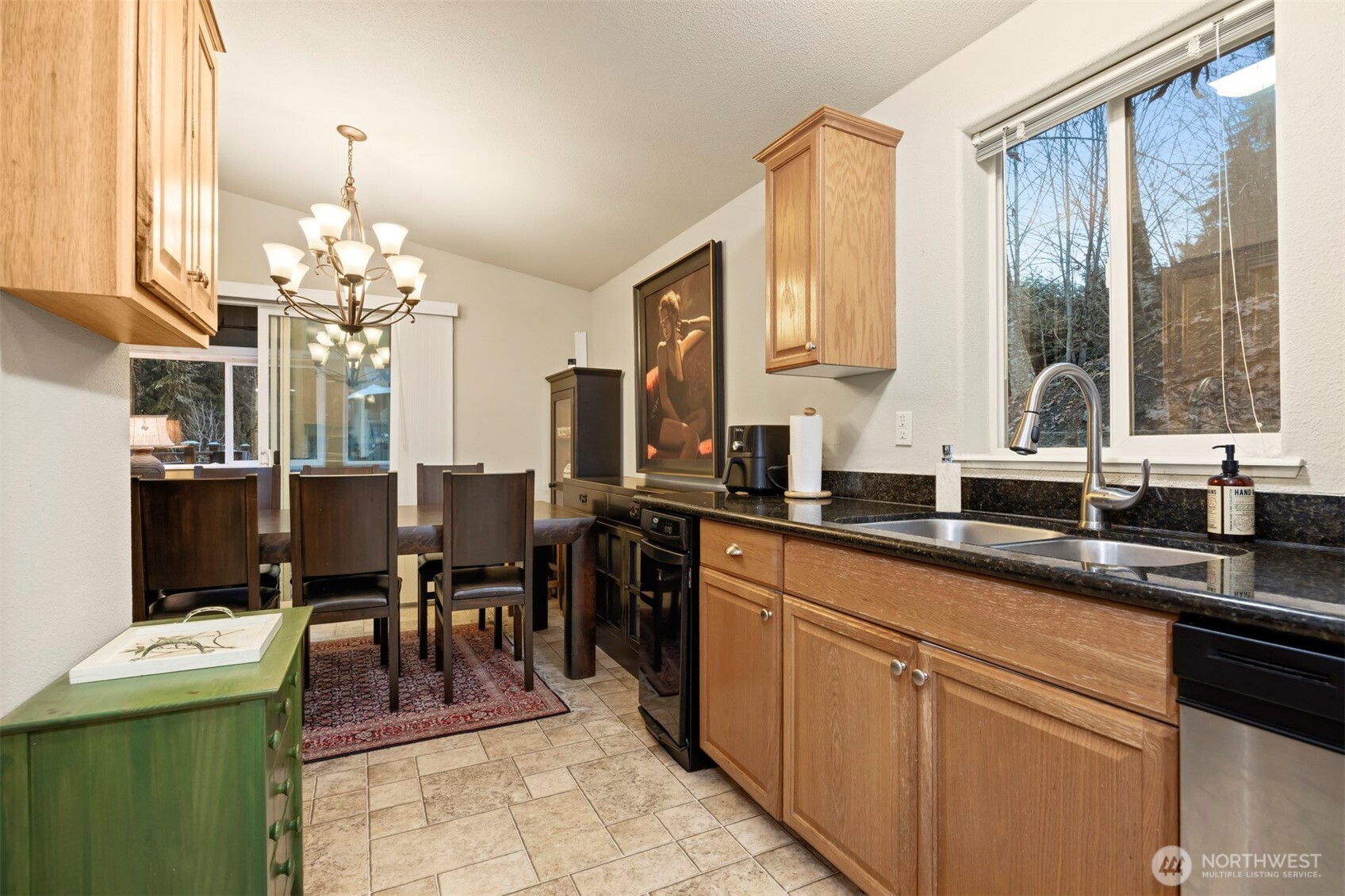 11027 Shuksan Rim Drive Deming, WA 98244 - Photo 11 of 39 a kitchen with a sink and cabinets