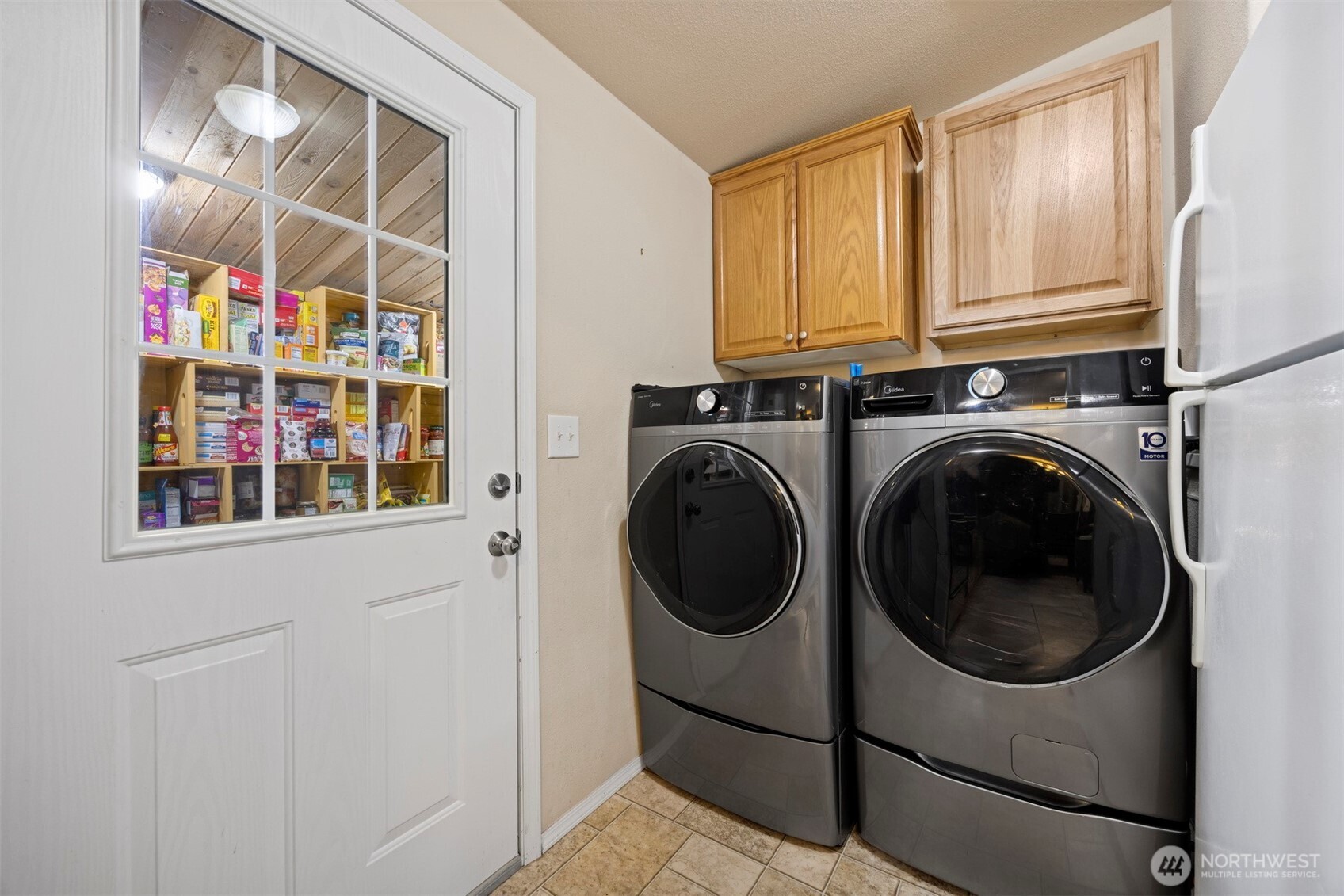 11027 Shuksan Rim Drive Deming, WA 98244 - Photo 13 of 39 a utility room with dryer and washer