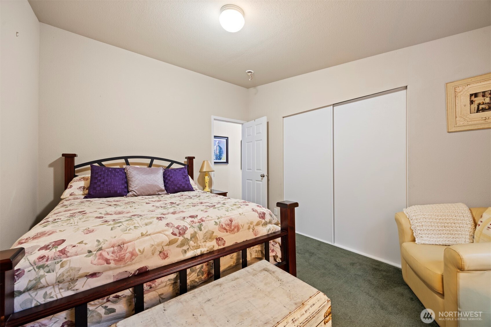 11027 Shuksan Rim Drive Deming, WA 98244 - Photo 23 of 39 a bedroom with a bed and wooden floor