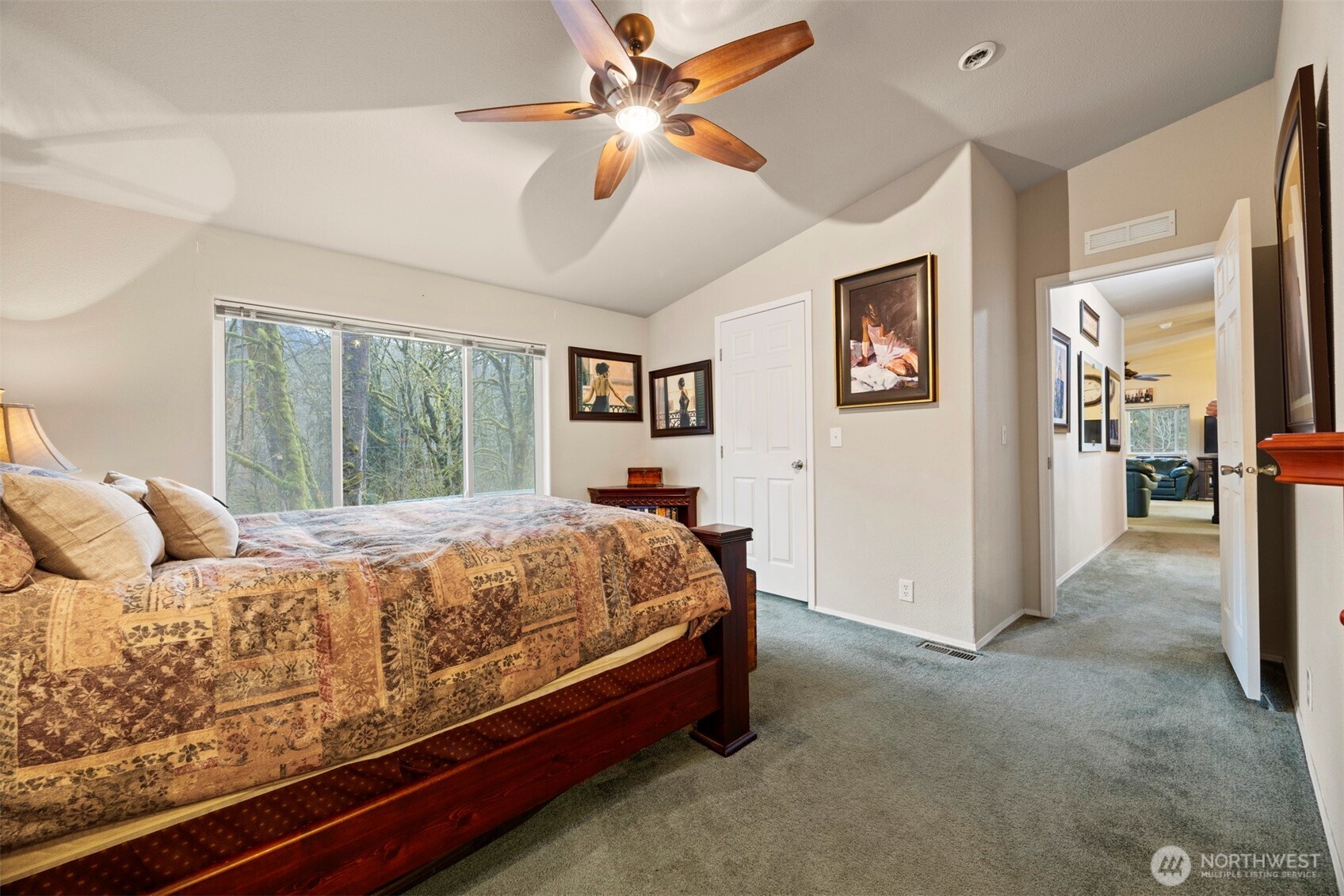 11027 Shuksan Rim Drive Deming, WA 98244 - Photo 24 of 39 a bed sitting in a spacious bedroom next to a window