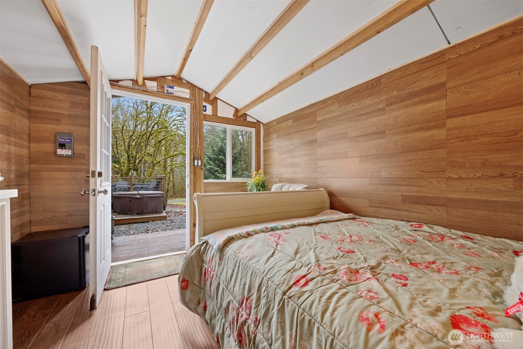 11027 Shuksan Rim Drive Deming, WA 98244 - Photo 29 of 39 a bedroom with a bed and a large window