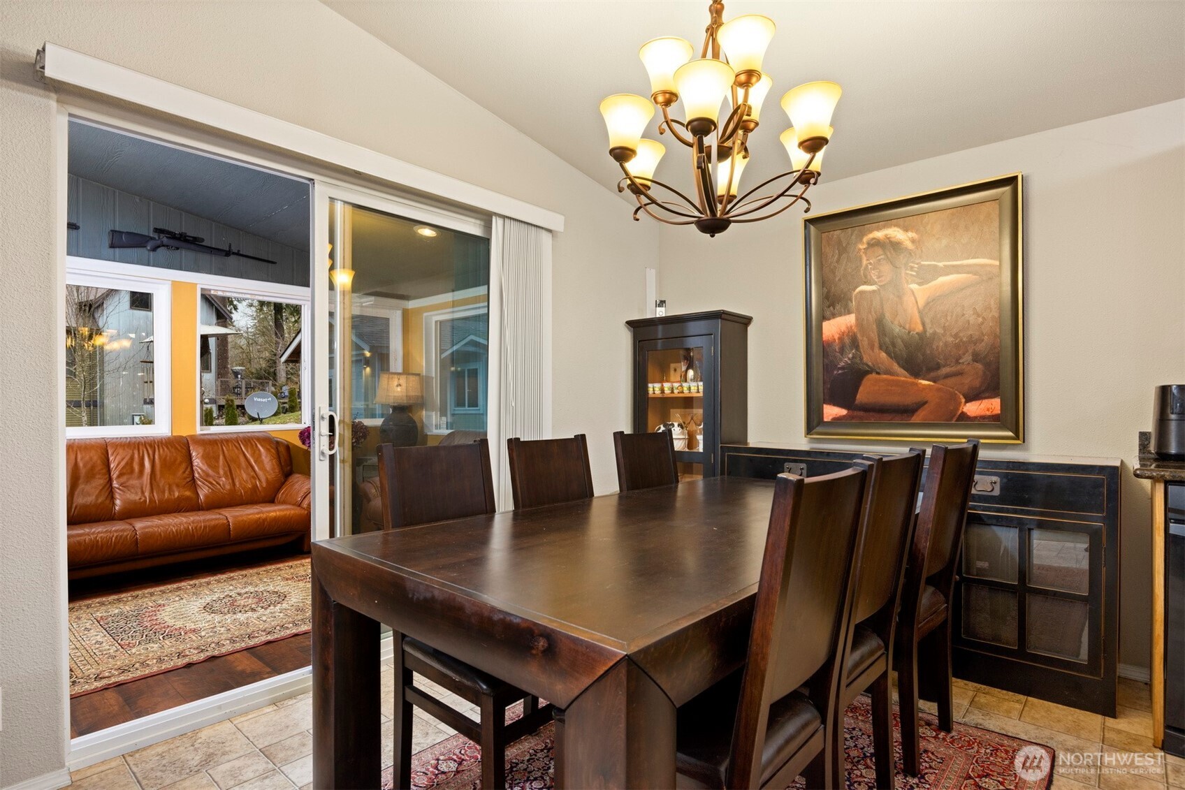 11027 Shuksan Rim Drive Deming, WA 98244 - Photo 8 of 39 a view of a dining room with furniture and wooden floor
