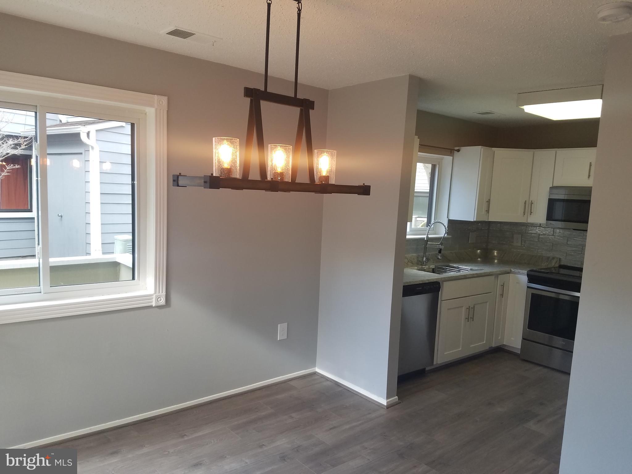 1897 Villaridge Drive, Unit A Reston, VA 20191 - Photo 9 of 24 Dining Room