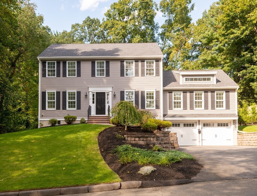 17 Pine Hill Road Lynnfield, MA 01940 - Photo 1 of 42 a front view of a residential apartment building with a yard