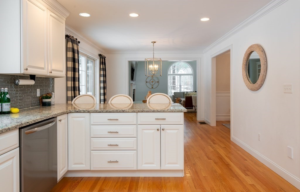 17 Pine Hill Road Lynnfield, MA 01940 - Photo 11 of 42 a spacious bathroom with a granite countertop sink mirror and vanity