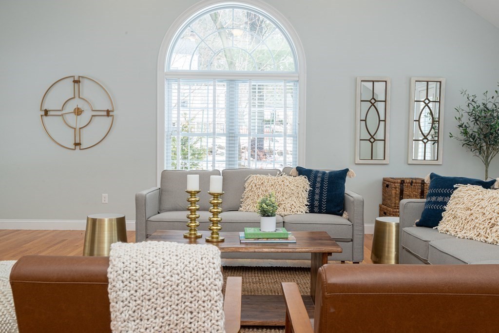 17 Pine Hill Road Lynnfield, MA 01940 - Photo 18 of 42 a living room with furniture and a large window