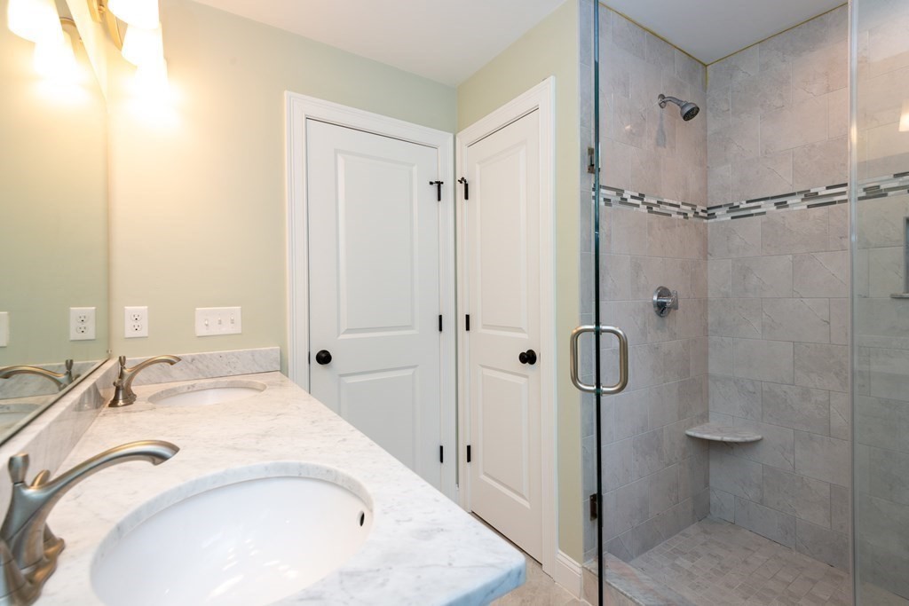 17 Pine Hill Road Lynnfield, MA 01940 - Photo 30 of 42 a bathroom with a sink and shower