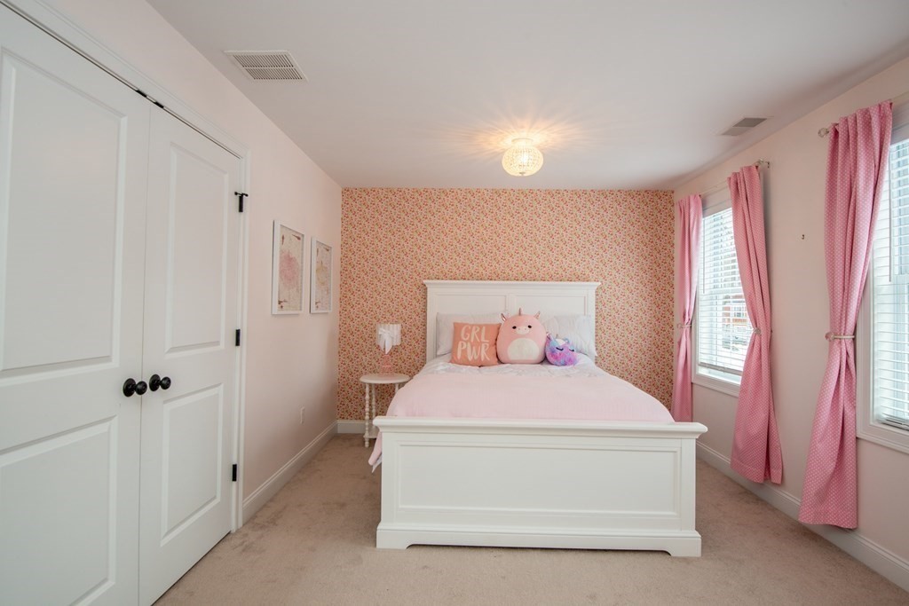 17 Pine Hill Road Lynnfield, MA 01940 - Photo 32 of 42 a bedroom with a bed and a window