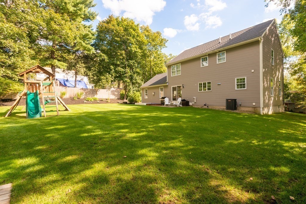 17 Pine Hill Road Lynnfield, MA 01940 - Photo 40 of 42 a view of a house with backyard