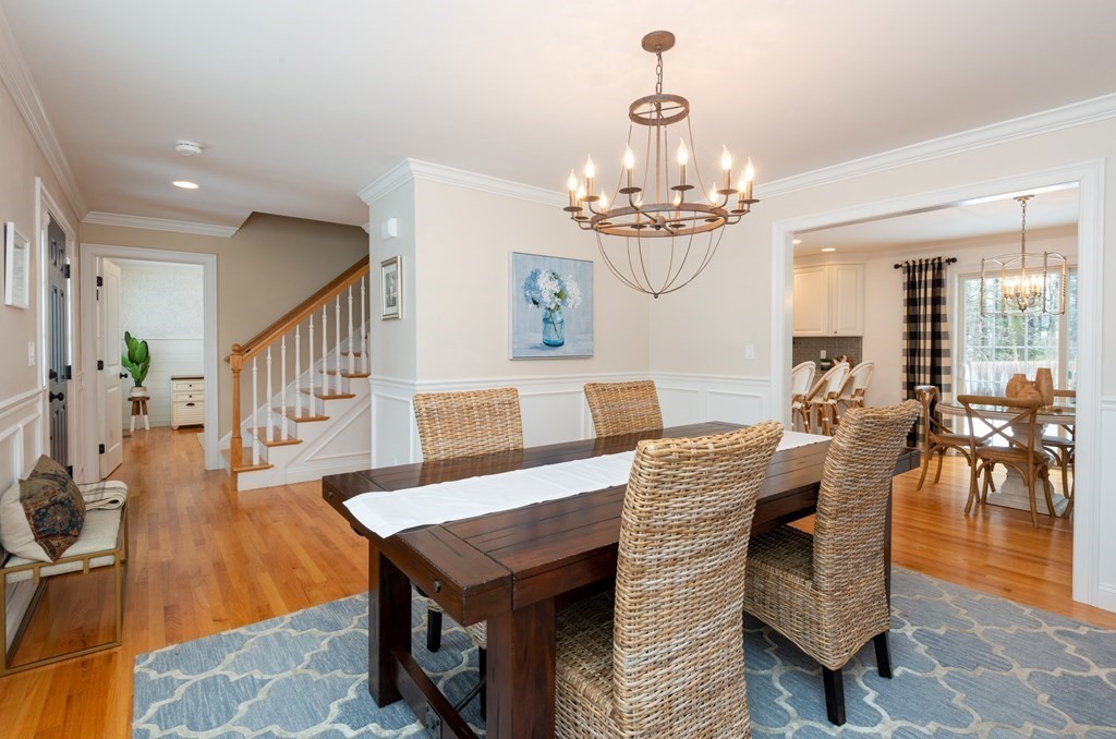 17 Pine Hill Road Lynnfield, MA 01940 - Photo 5 of 42 a living room with furniture and a chandelier