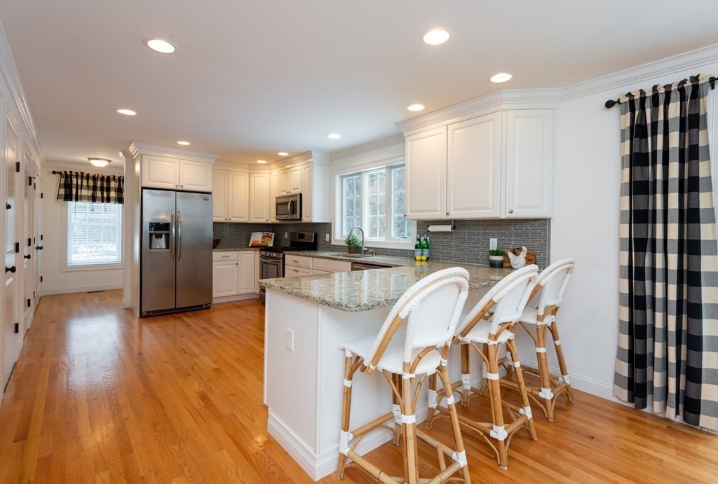 17 Pine Hill Road Lynnfield, MA 01940 - Photo 10 of 42 a kitchen with stainless steel appliances granite countertop a refrigerator and a sink