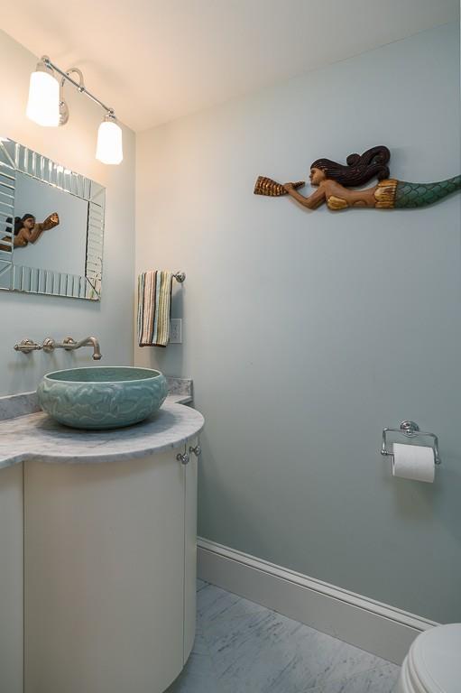 76 High Popples Road Gloucester, MA 01930 - Photo 8 of 19 a view of a sink and a mirror