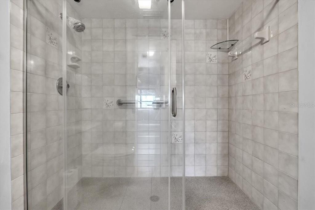 23465 Harbor View Road, Unit 624 Port Charlotte, FL 33980 - Photo 23 of 47 a bathroom with a shower