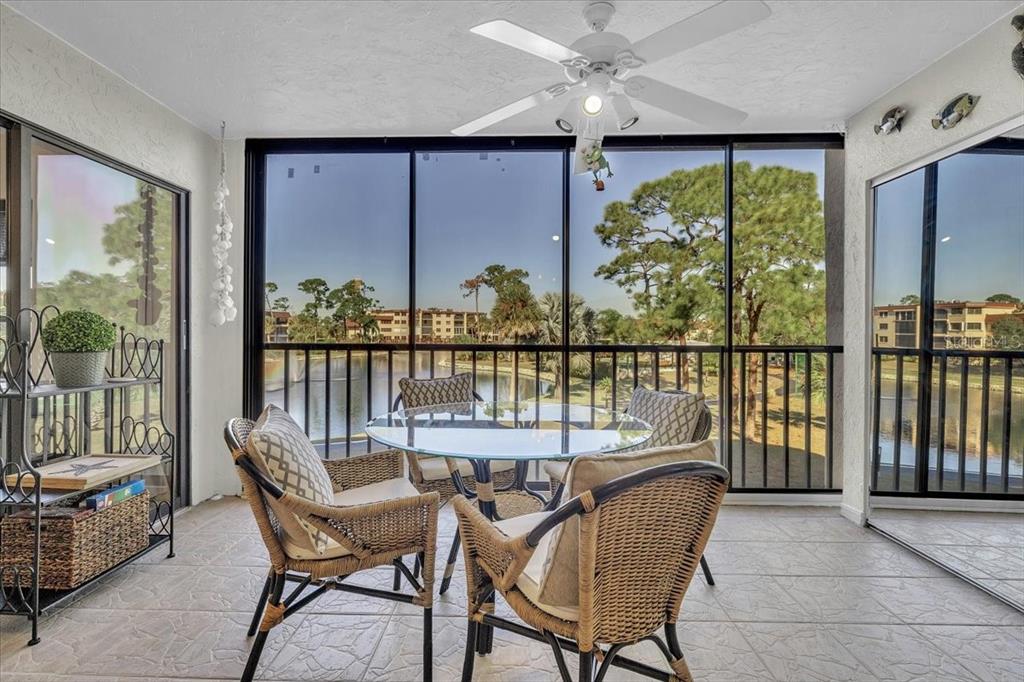 23465 Harbor View Road, Unit 624 Port Charlotte, FL 33980 - Photo 29 of 47 a view of a dining room with furniture window and outside view