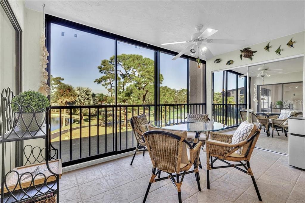 23465 Harbor View Road, Unit 624 Port Charlotte, FL 33980 - Photo 30 of 47 a view of a porch with furniture