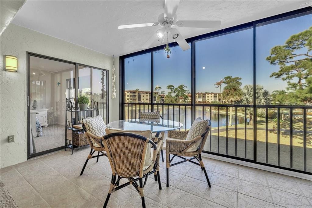 23465 Harbor View Road, Unit 624 Port Charlotte, FL 33980 - Photo 3 of 47 a view of a dining room with furniture window and outside view