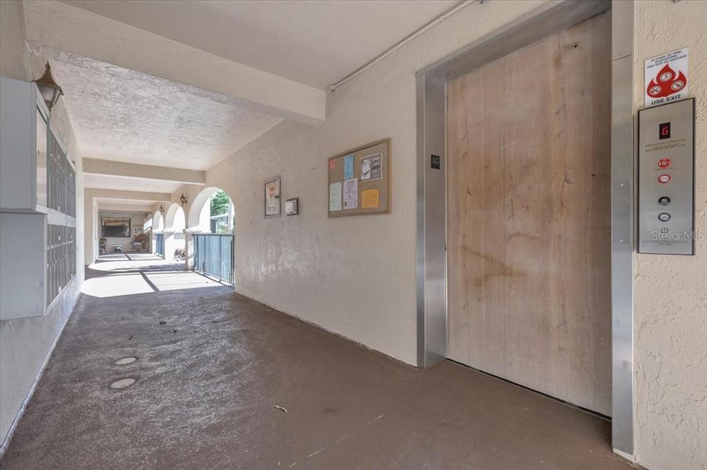 23465 Harbor View Road, Unit 624 Port Charlotte, FL 33980 - Photo 33 of 47 a view of hallway with livingroom and bedroom