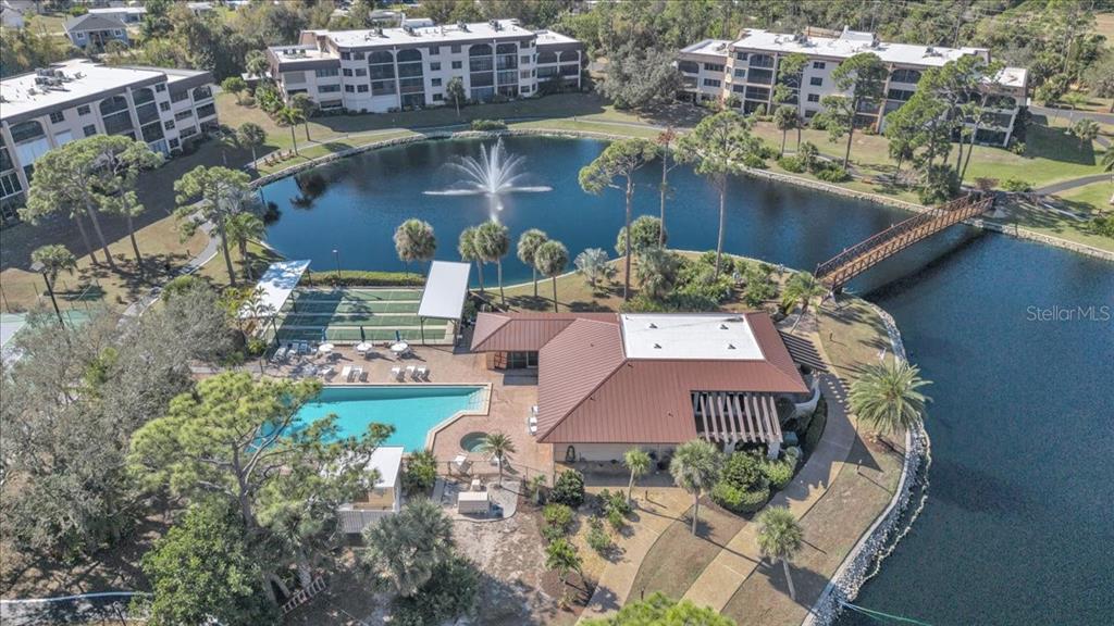 23465 Harbor View Road, Unit 624 Port Charlotte, FL 33980 - Photo 44 of 47 a view of a balcony with two chairs and a table