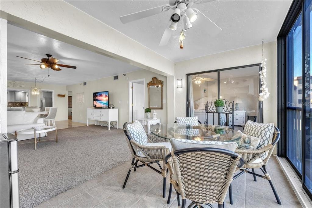 23465 Harbor View Road, Unit 624 Port Charlotte, FL 33980 - Photo 6 of 47 a dining room with furniture and window