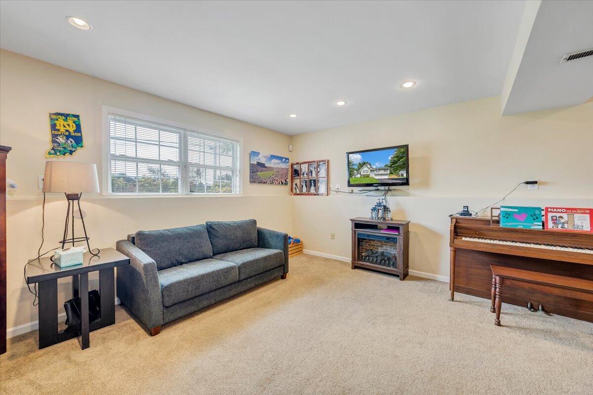 1522 Mountain View Road Vinton, VA 24179 - Photo 19 of 32 a living room with furniture and a flat screen tv