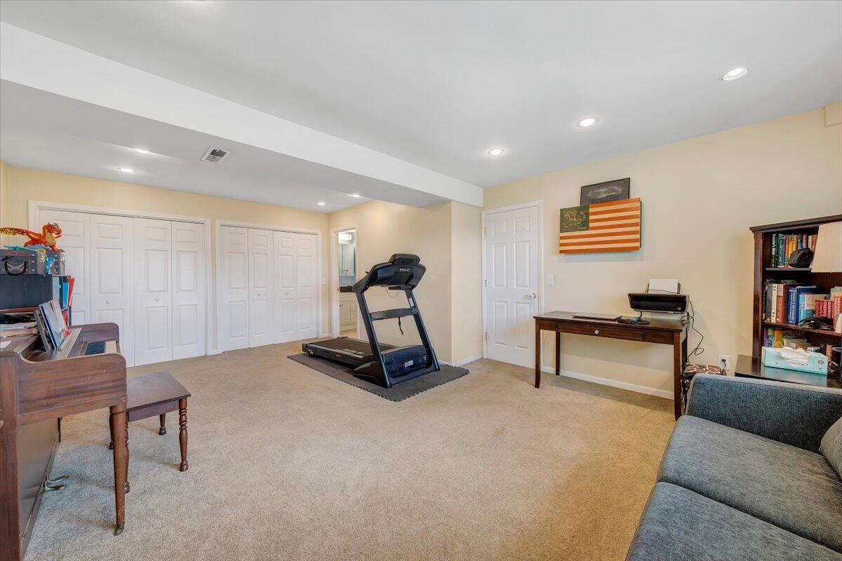 1522 Mountain View Road Vinton, VA 24179 - Photo 20 of 32 a living room with furniture and a gym equipment