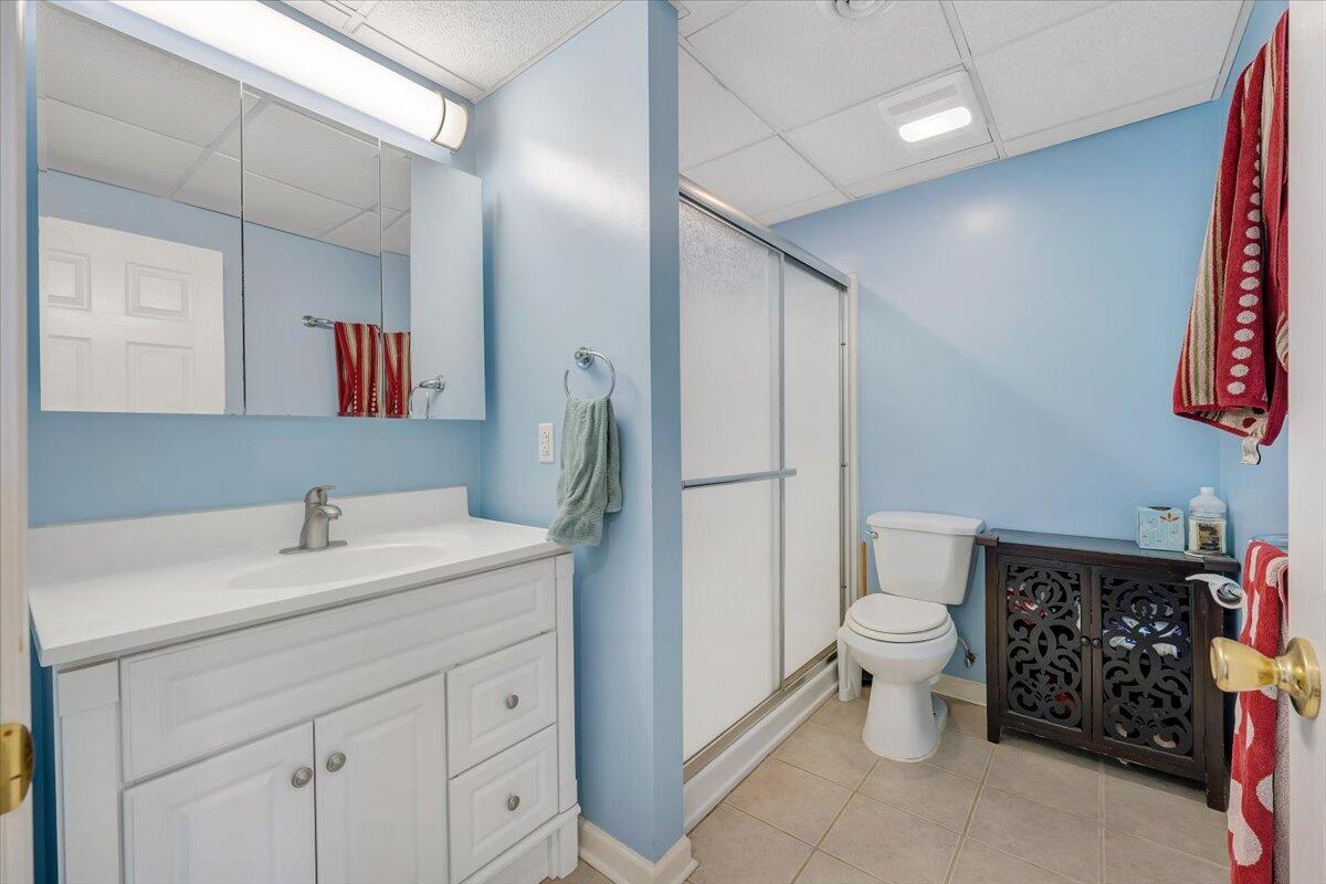 1522 Mountain View Road Vinton, VA 24179 - Photo 23 of 32 a bathroom with a sink toilet and a mirror