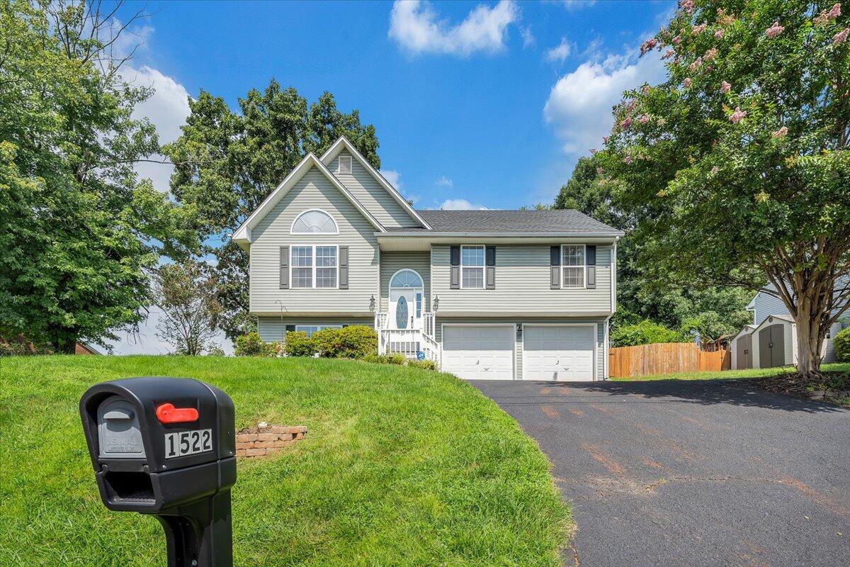 1522 Mountain View Road Vinton, VA 24179 - Photo 32 of 32 a front view of a house with garden