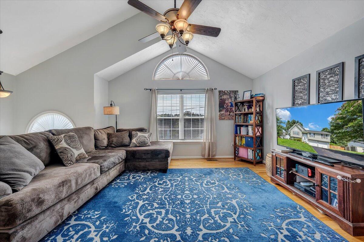 1522 Mountain View Road Vinton, VA 24179 - Photo 6 of 32 a living room with furniture and a book shelf