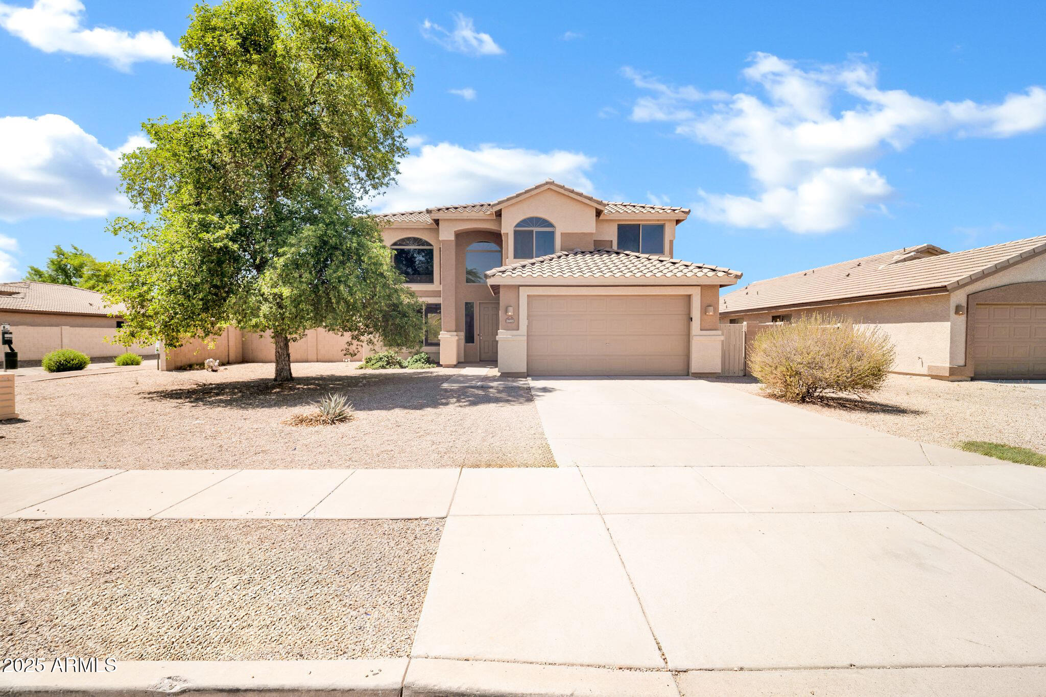2605 West Darrel Road Phoenix, AZ 85041 - Photo 1 of 33 a house with trees in front of it