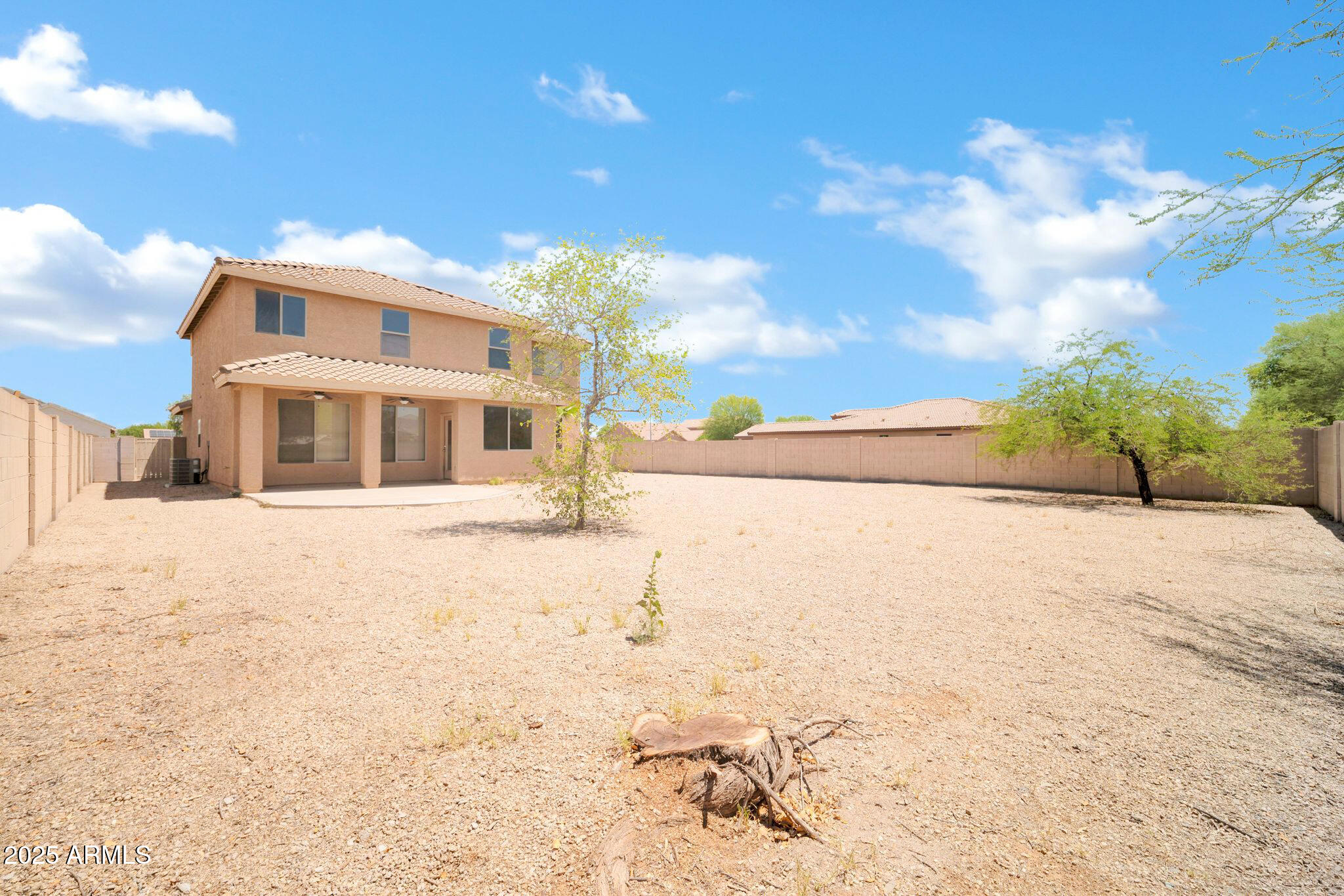 2605 West Darrel Road Phoenix, AZ 85041 - Photo 32 of 33 a front view of a house with a yard
