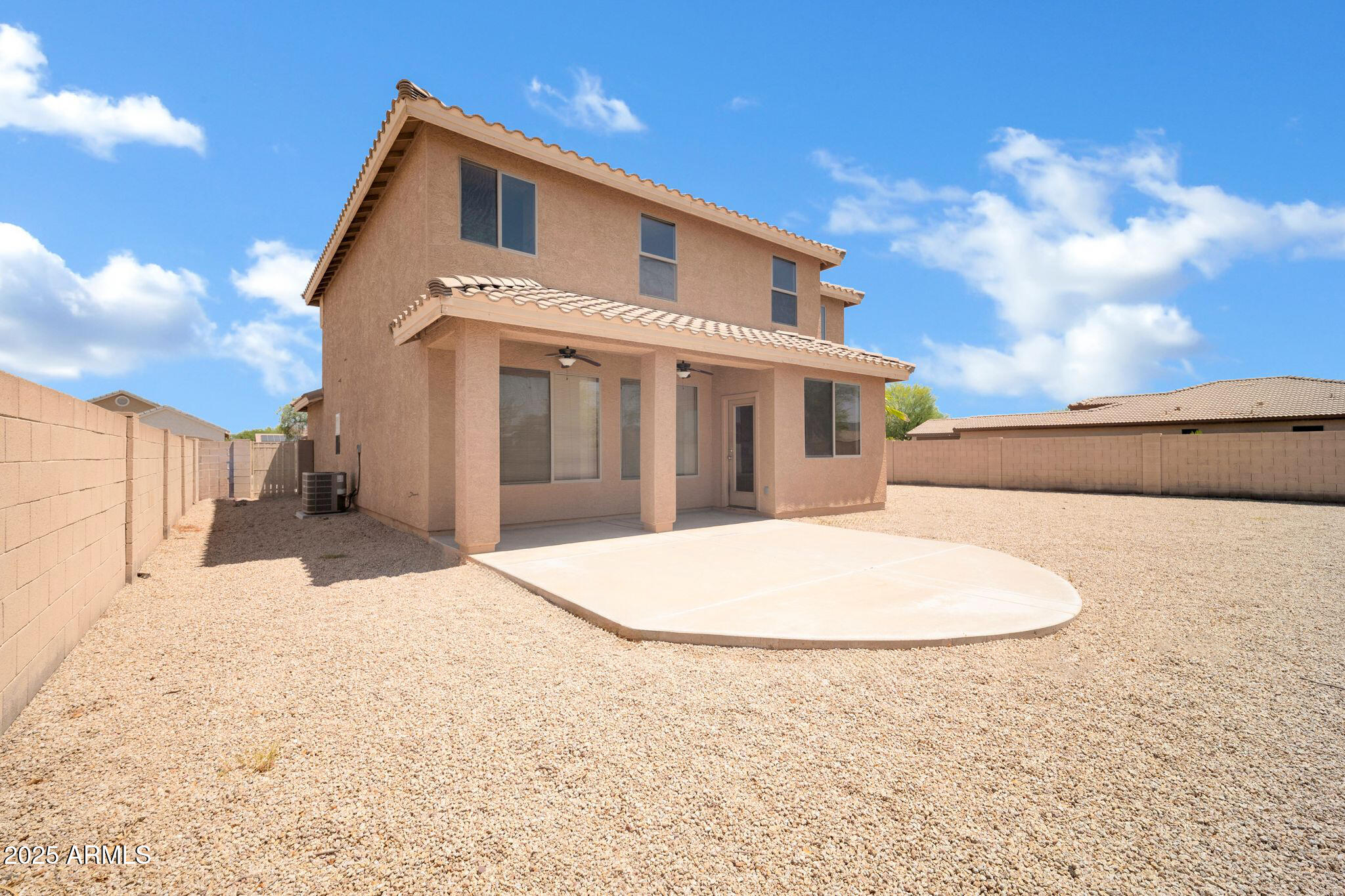 2605 West Darrel Road Phoenix, AZ 85041 - Photo 33 of 33 a view of a white house with a snow