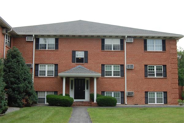 26 Leonard Road, Unit 26 Boxborough, MA 01719 - Photo 1 of 10 a front view of a house with garden