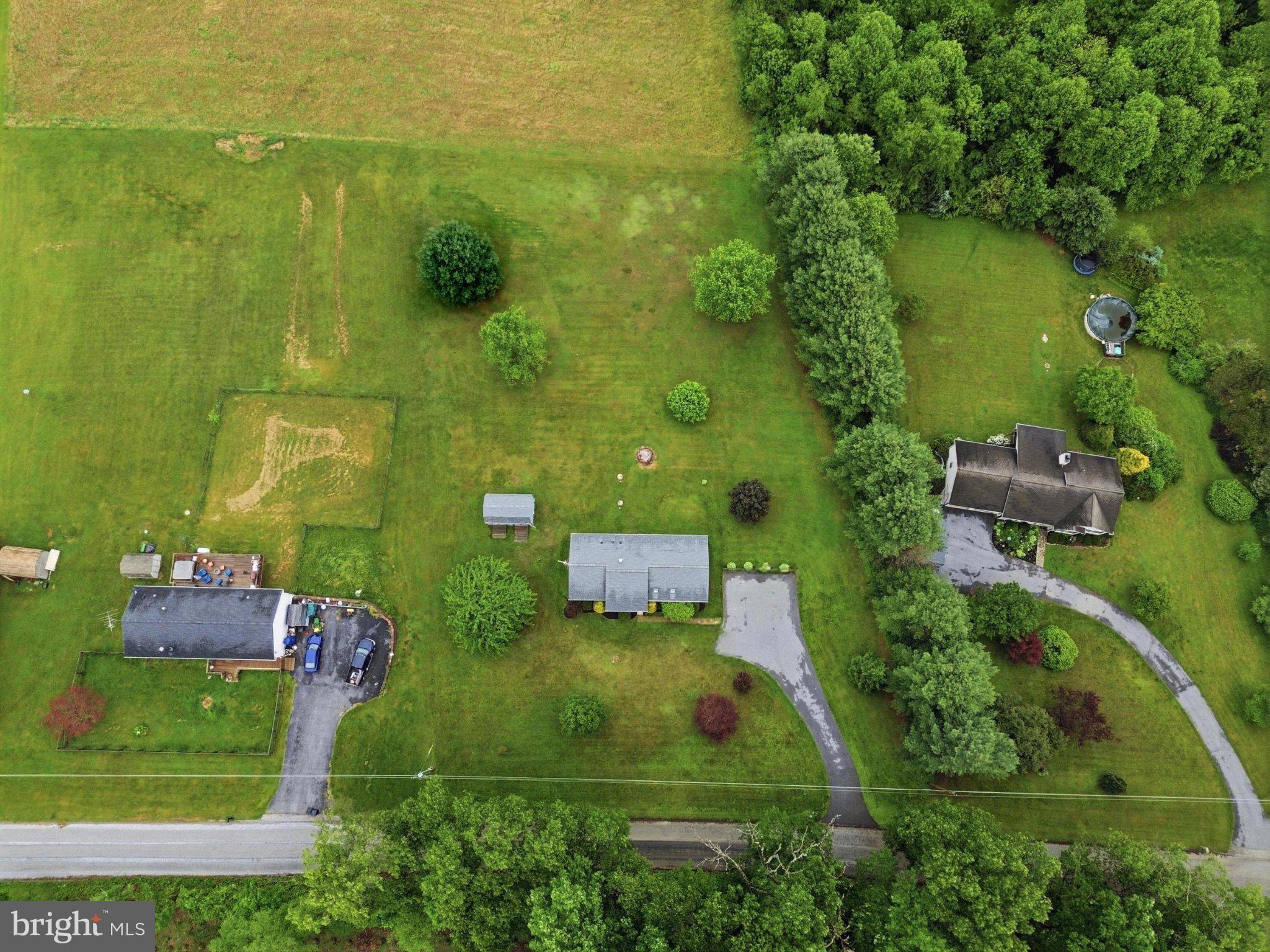 491 Garvine Mill Road Fawn Grove, PA 17321 - Photo 37 of 47 an aerial view of a house with a yard and lake view