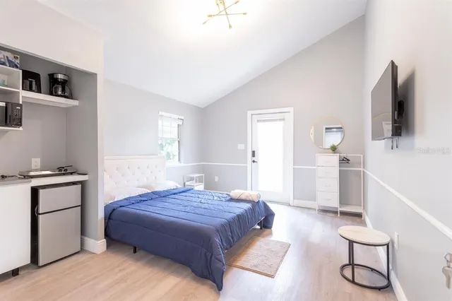 a bathroom with a sink vanity mirror and toilet