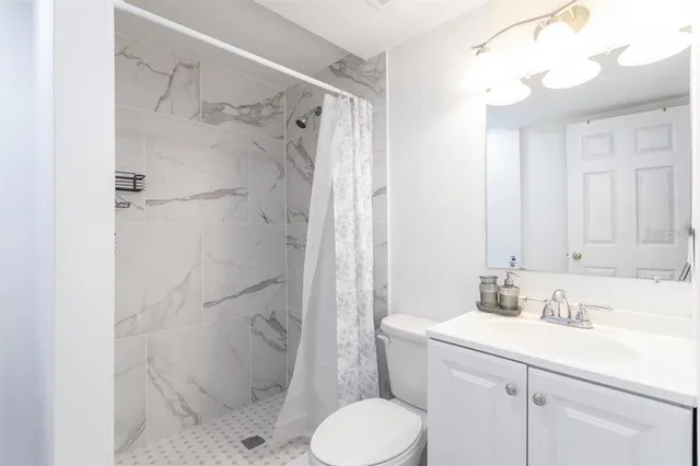 a view of a house with yard