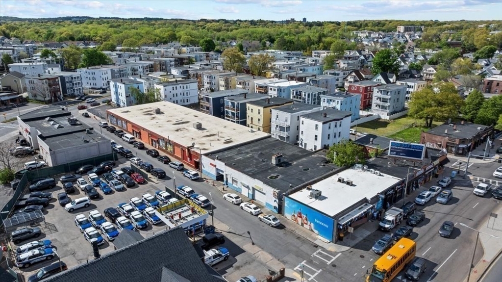 3-5 Rhoades Street Boston, MA 02124 - Photo 5 of 11 an aerial view of a city with lots of residential buildings