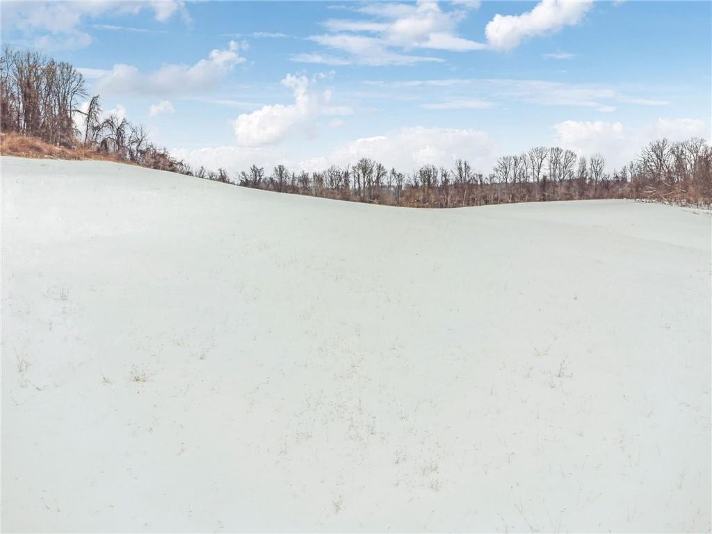 0 Senchur Road Greensburg, PA 15601 - Photo 7 of 10 a view of a lake with houses in back