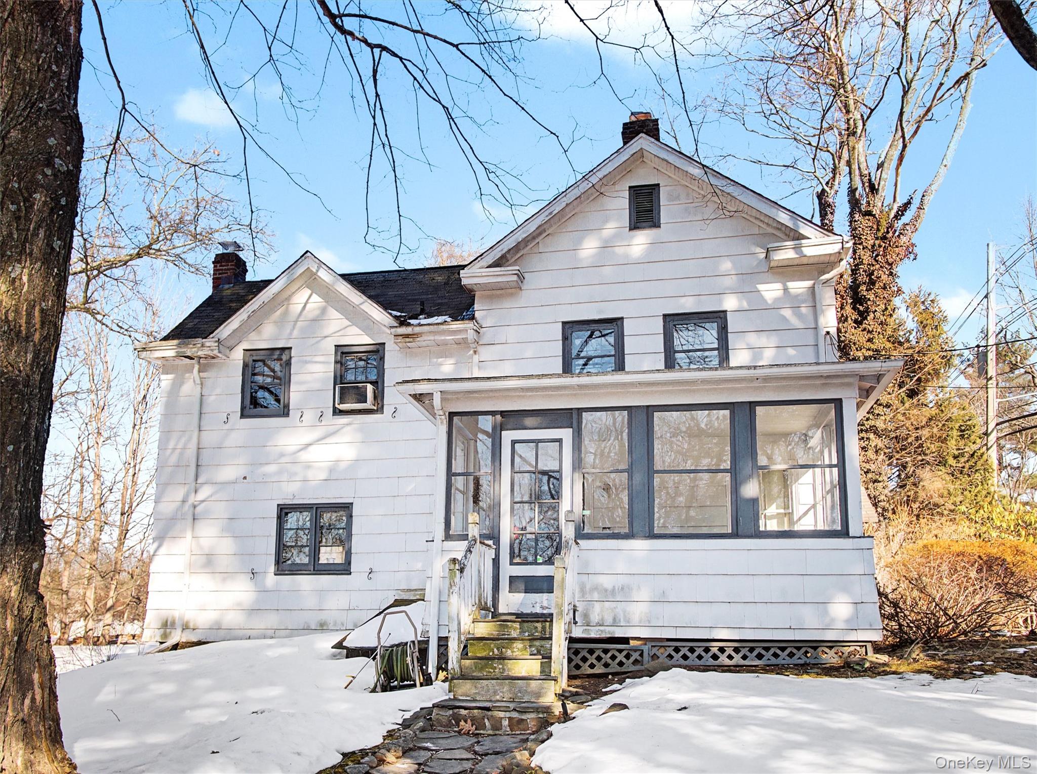 62 North Airmont Road Suffern, NY 10901 - Photo 2 of 15 a front view of a house with a yard