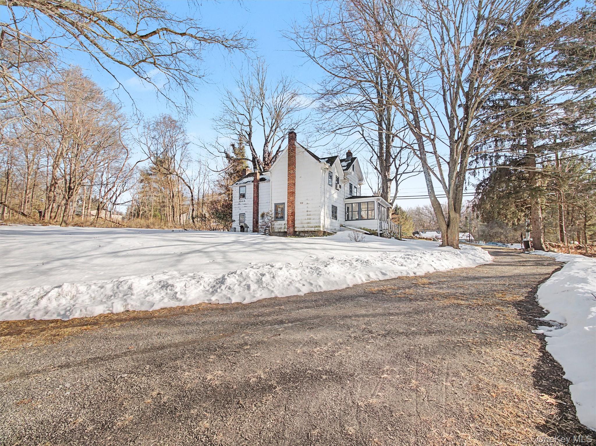 62 North Airmont Road Suffern, NY 10901 - Photo 5 of 15 a view of road with large trees