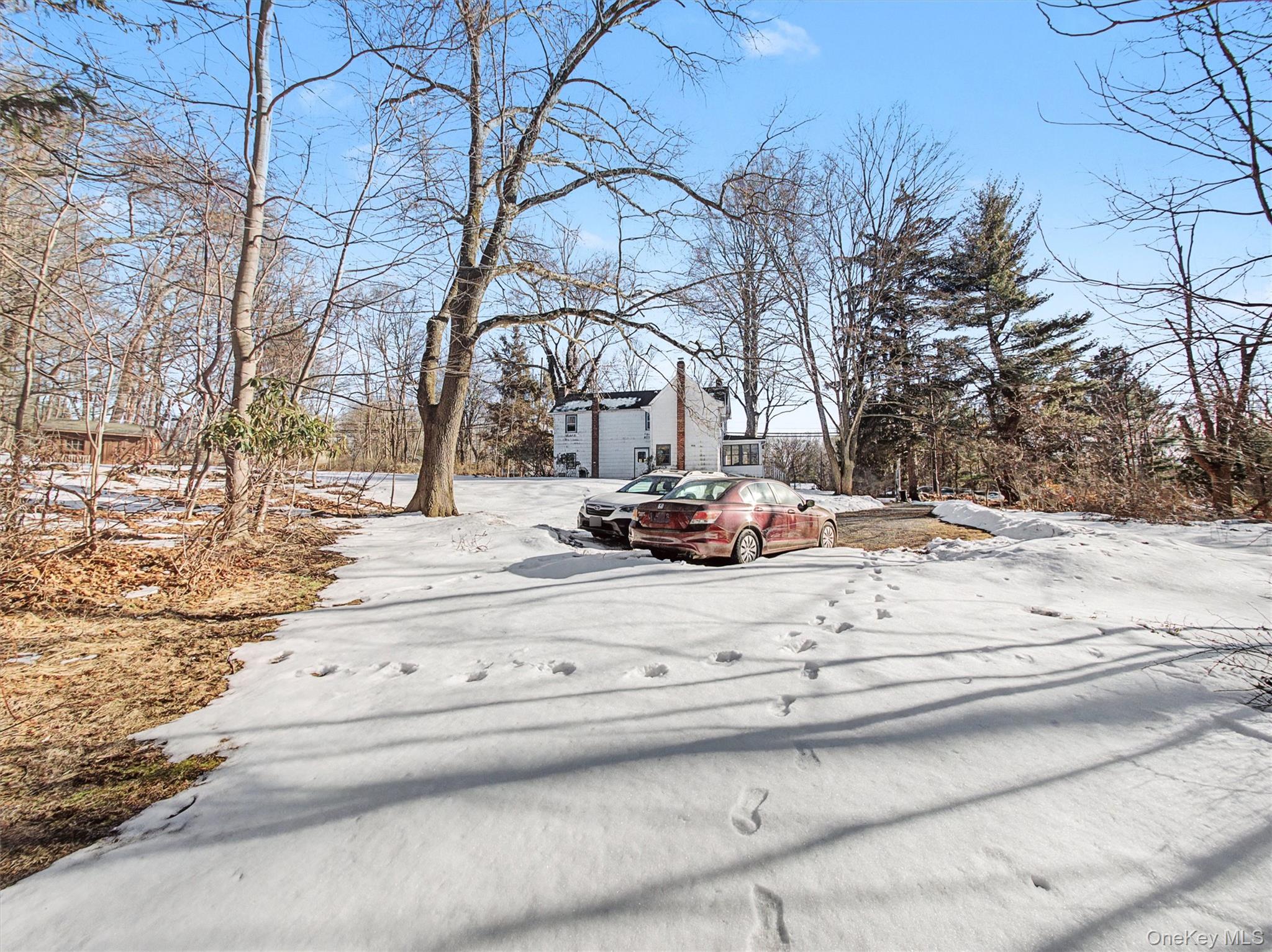 62 North Airmont Road Suffern, NY 10901 - Photo 10 of 15 a view of parking space with snow on the road