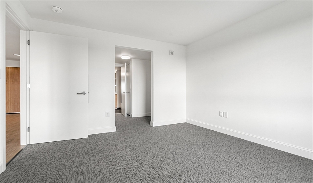 99 Kneeland Street, Unit 1407 Boston, MA 02111 - Photo 4 of 14 a view of an empty room