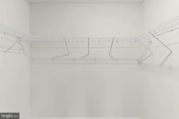 a view of a room with racks on the wall