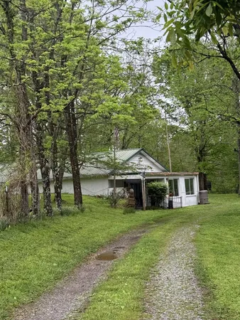a close up of a wall with a sign on a wall