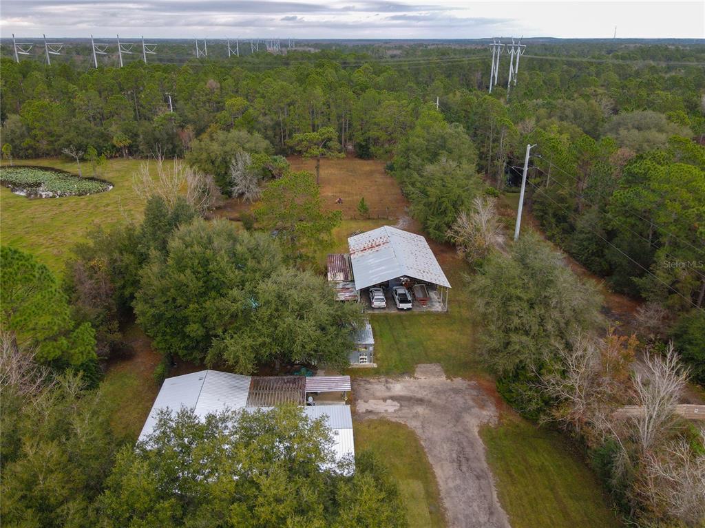 998 Meade Road Geneva, FL 32732 - Photo 1 of 1 a aerial view of a house with a yard