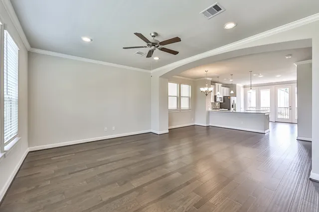 a kitchen with a stove and a refrigerator