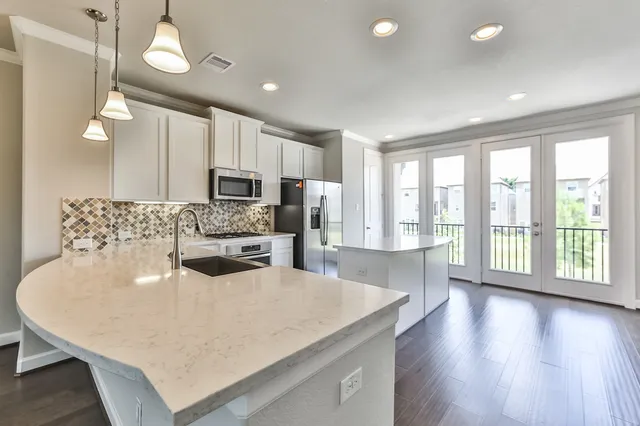 a bathroom with a sink and mirror